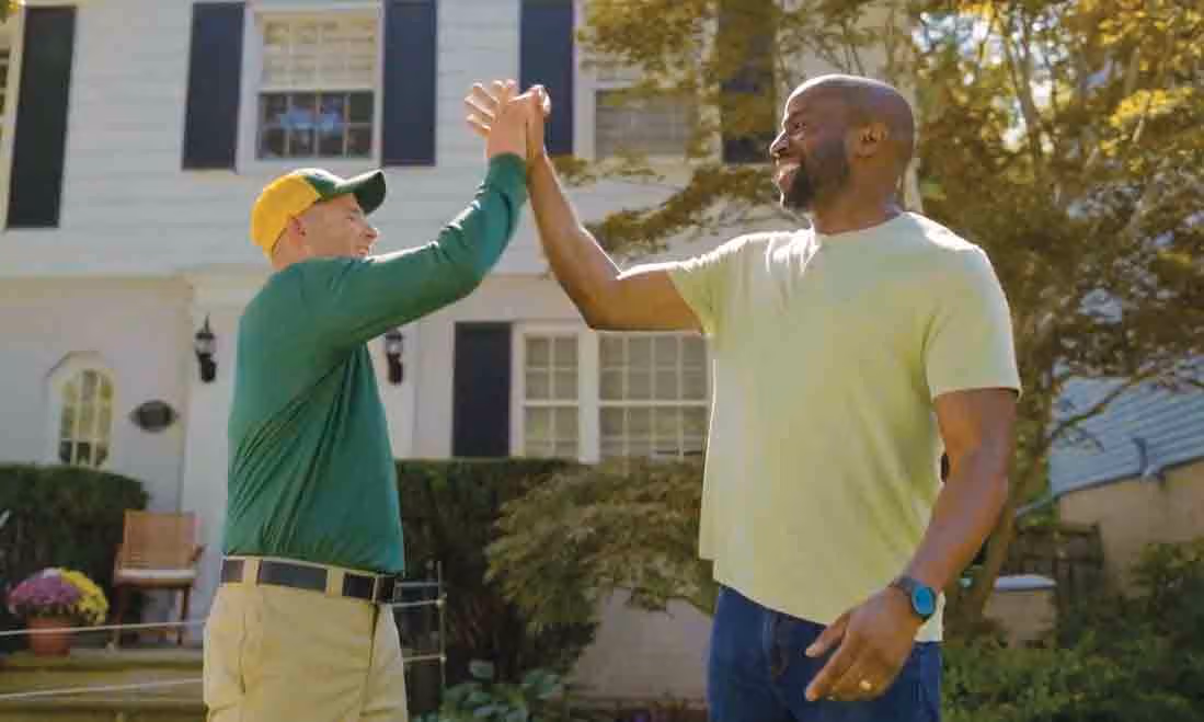 Up High! Celebrate Your Lawn Care Wins with Weed Man